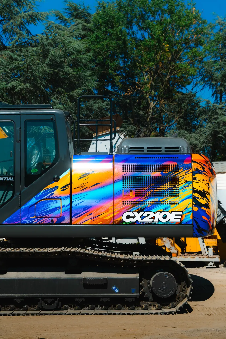 Pelleteuse CX210E en covering design imprimé